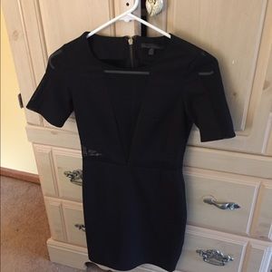 Black mini dress with mesh cut outs